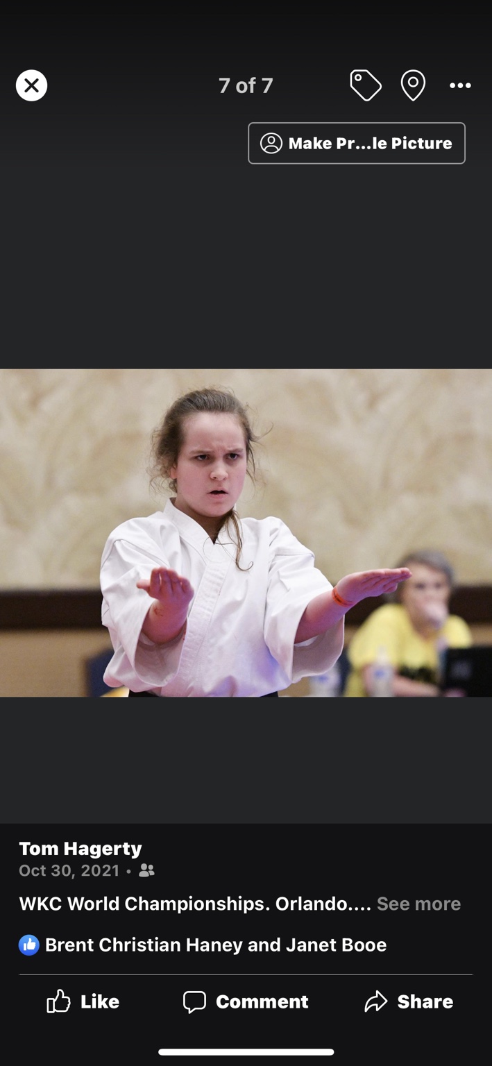 Lizzie demonstrating a focused martial arts form